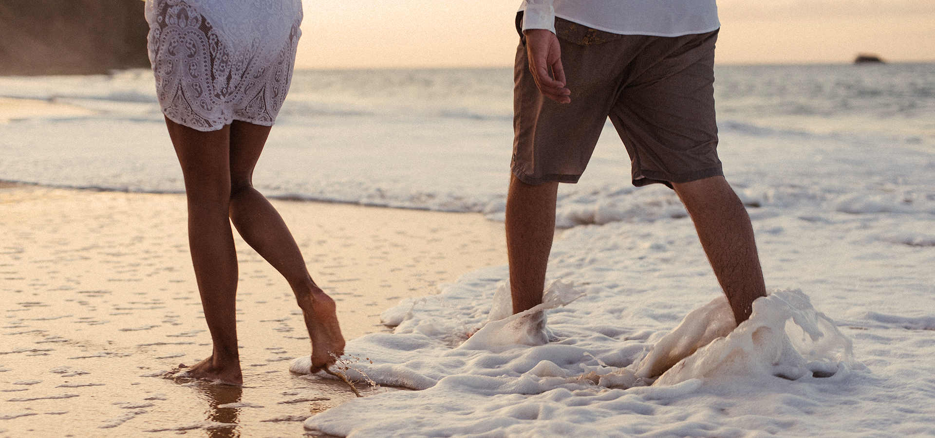 Couple walking on the beach